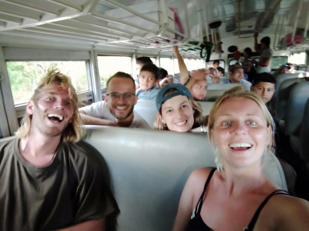 friends on the bus to paradise