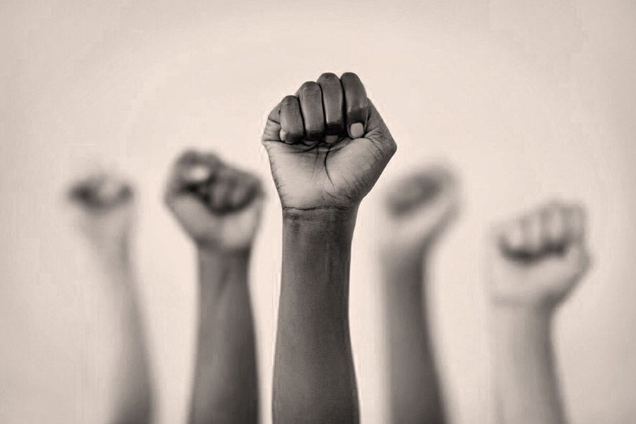 Black Lives Matter fists raised. Blog.